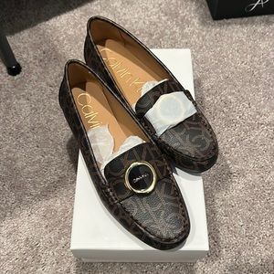 Calvin Klein Women’s Brown Leana Monogram Smooth Slip-on Shoes
